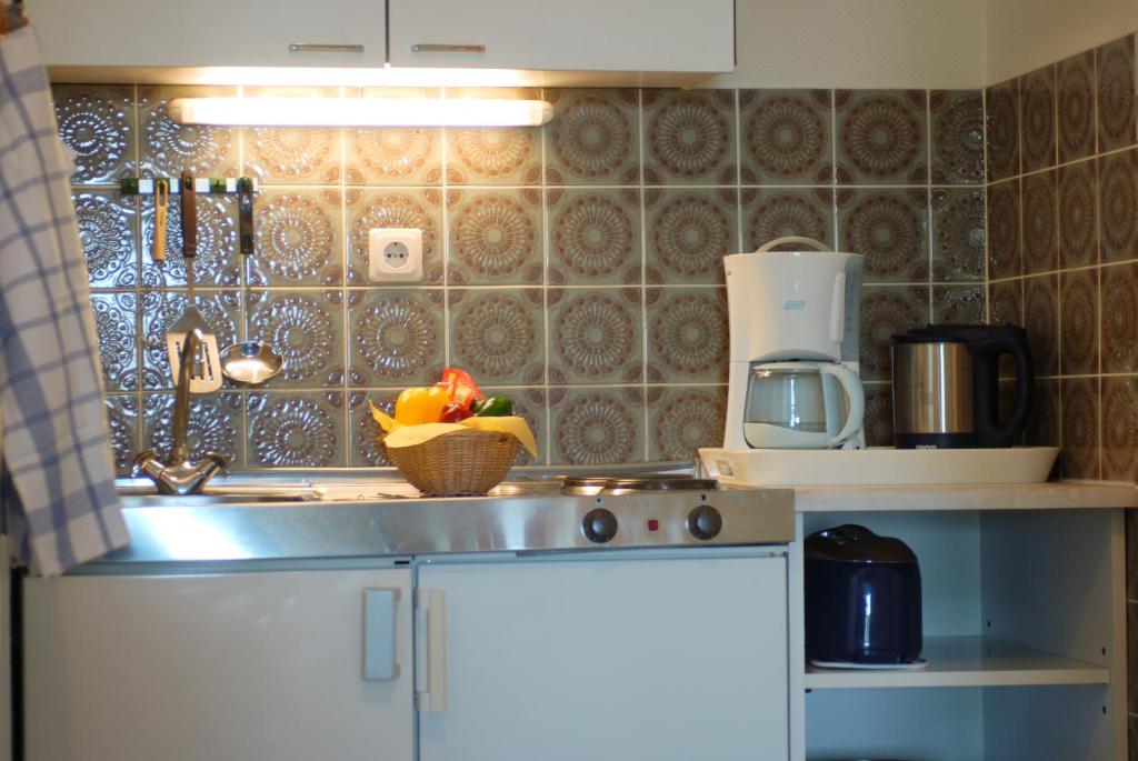 Kuchyň nebo kuchyňský kout v ubytování Ferienhaus Uklei