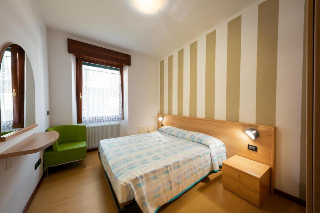 Кровать или кровати в номере Appartamenti Mare Caorle