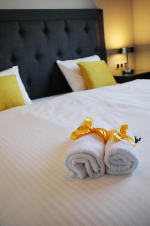 Posteľ alebo postele v izbe v ubytovaní City Marine Luxury Apartments