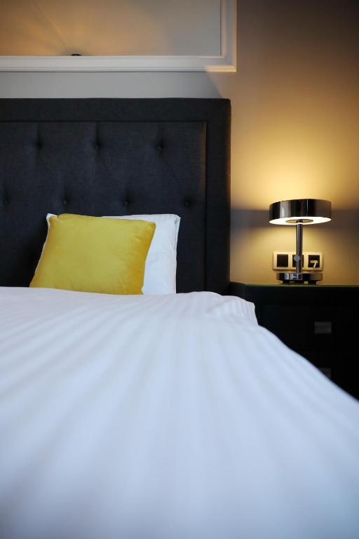 Posteľ alebo postele v izbe v ubytovaní City Marine Luxury Apartments