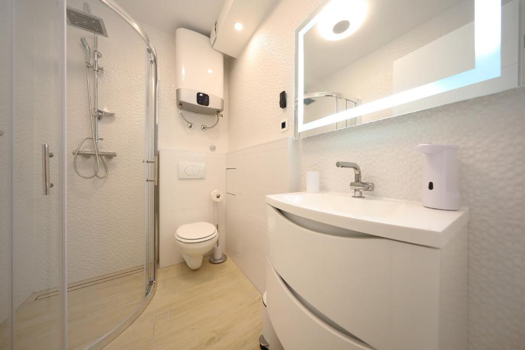 Kúpeľňa v ubytovaní City Marine Luxury Apartments