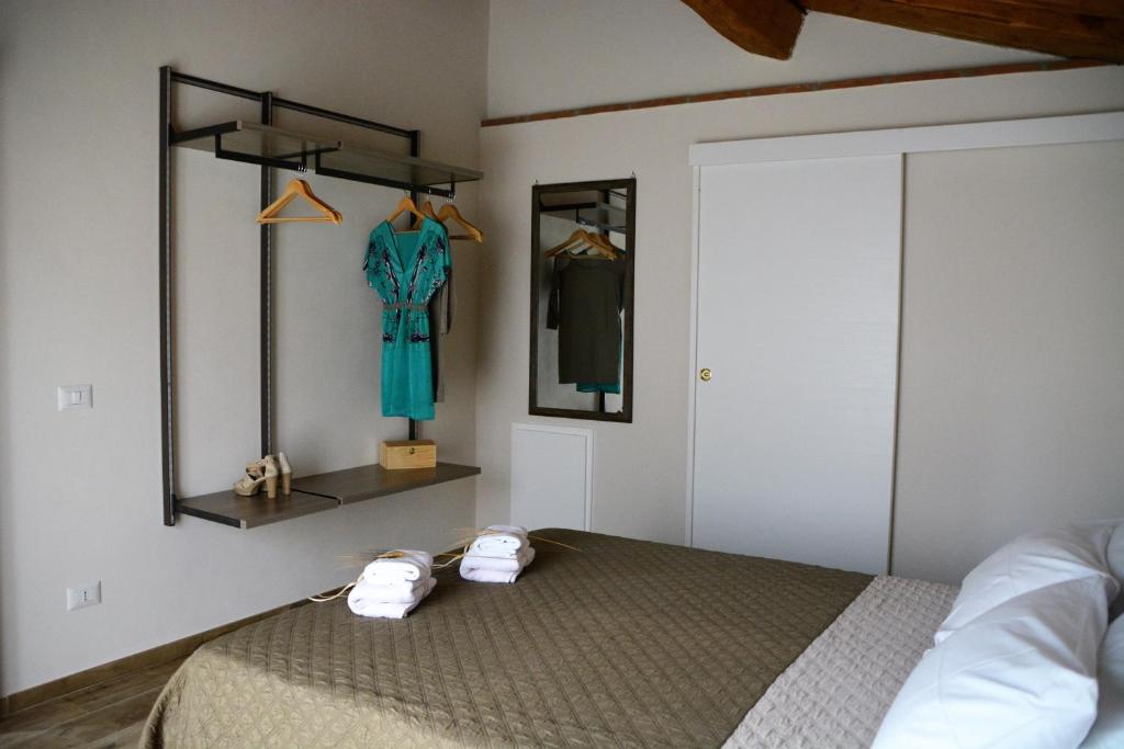 Postel nebo postele na pokoji v ubytování Agriturismo L'Aquilone