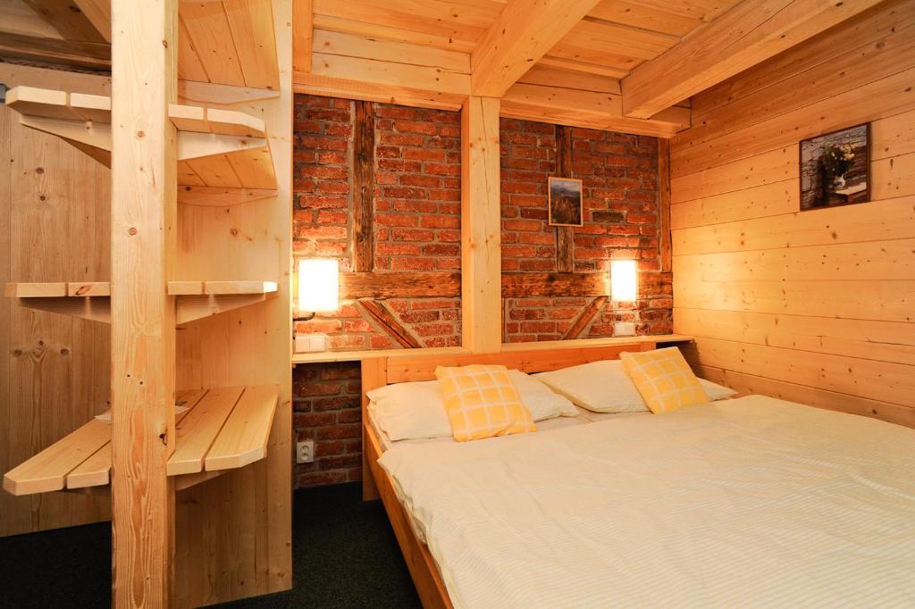 Postel nebo postele na pokoji v ubytování Josefova Bouda -Resort Svaty Frantisek