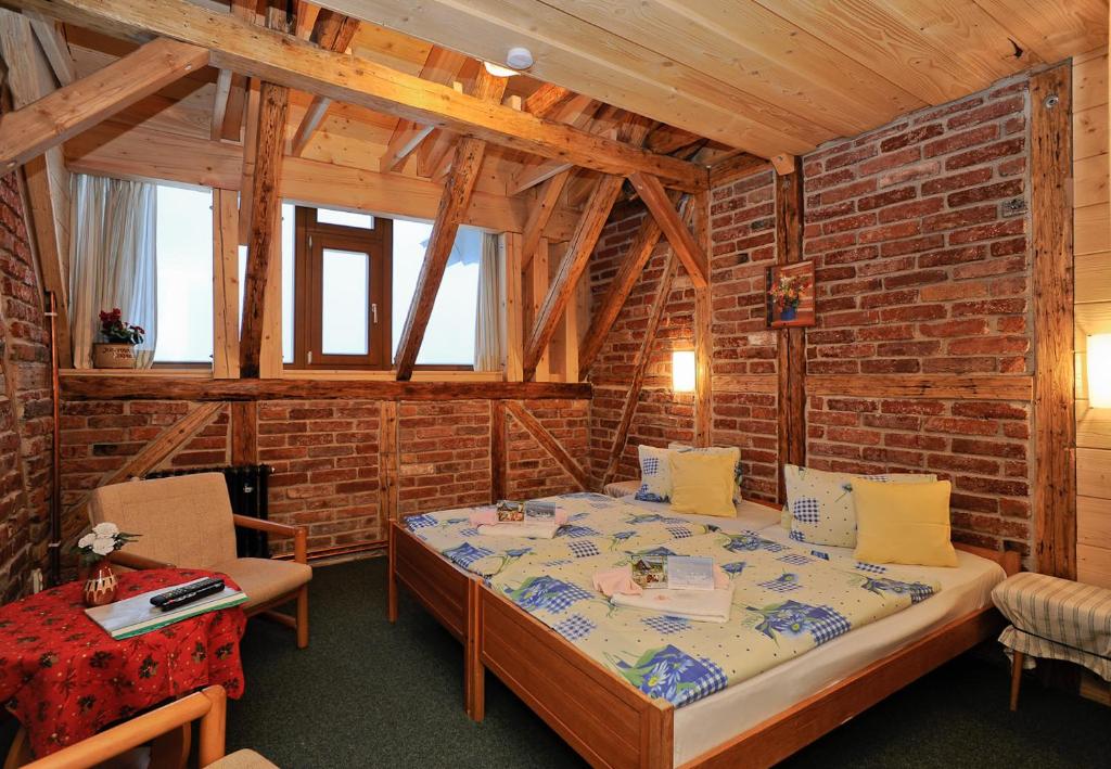 Postel nebo postele na pokoji v ubytování Josefova Bouda -Resort Svaty Frantisek