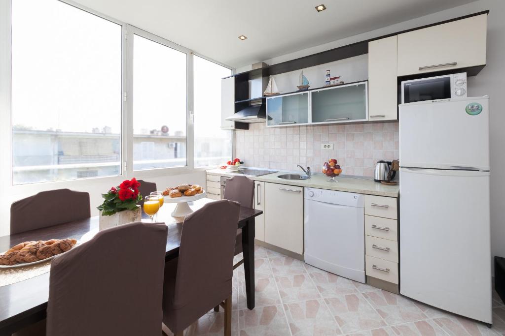 Kuchyňa alebo kuchynka v ubytovaní Apartman Bordura