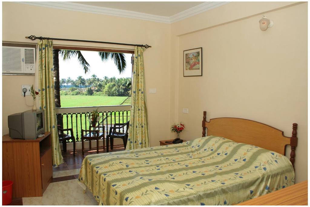 Postel nebo postele na pokoji v ubytování Alagoa Resort