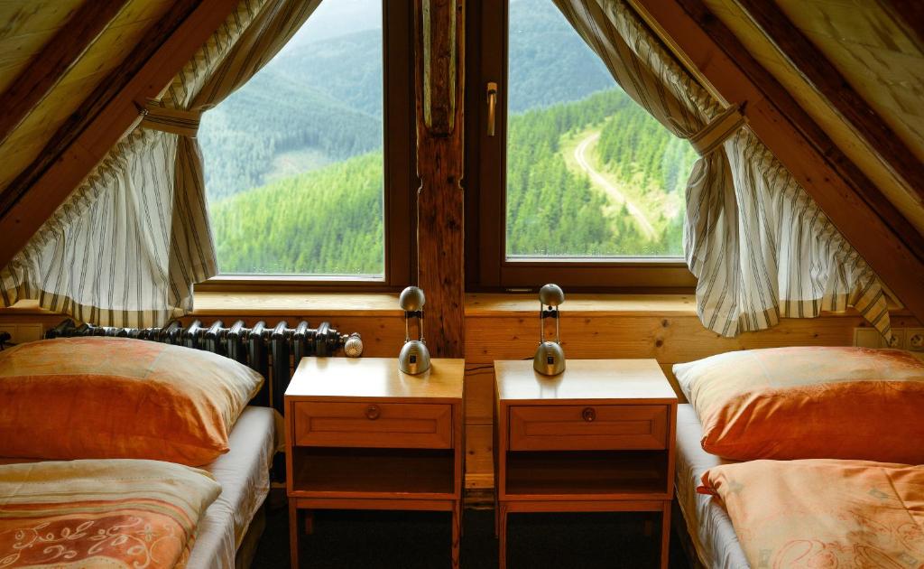 Postel nebo postele na pokoji v ubytování Josefova Bouda -Resort Svaty Frantisek