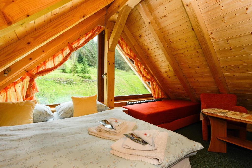 Postel nebo postele na pokoji v ubytování Josefova Bouda -Resort Svaty Frantisek