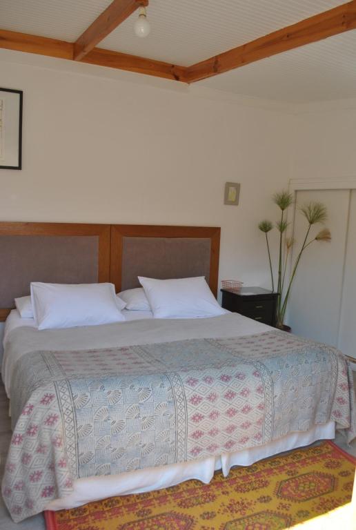 Una cama o camas en una habitación de Hotel Boutique Molzano