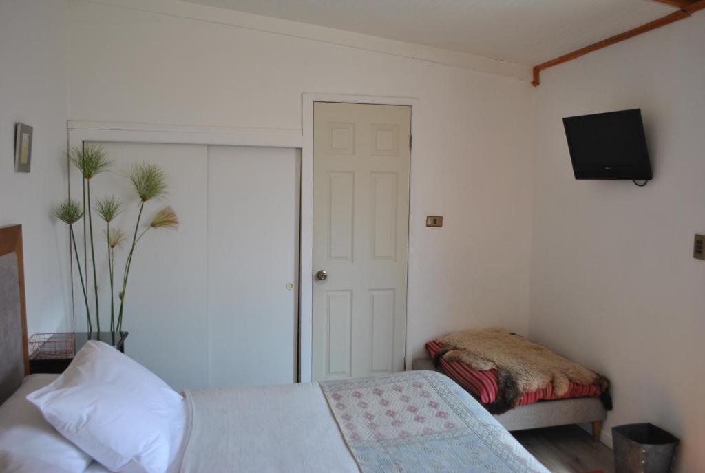 Una cama o camas en una habitación de Hotel Boutique Molzano