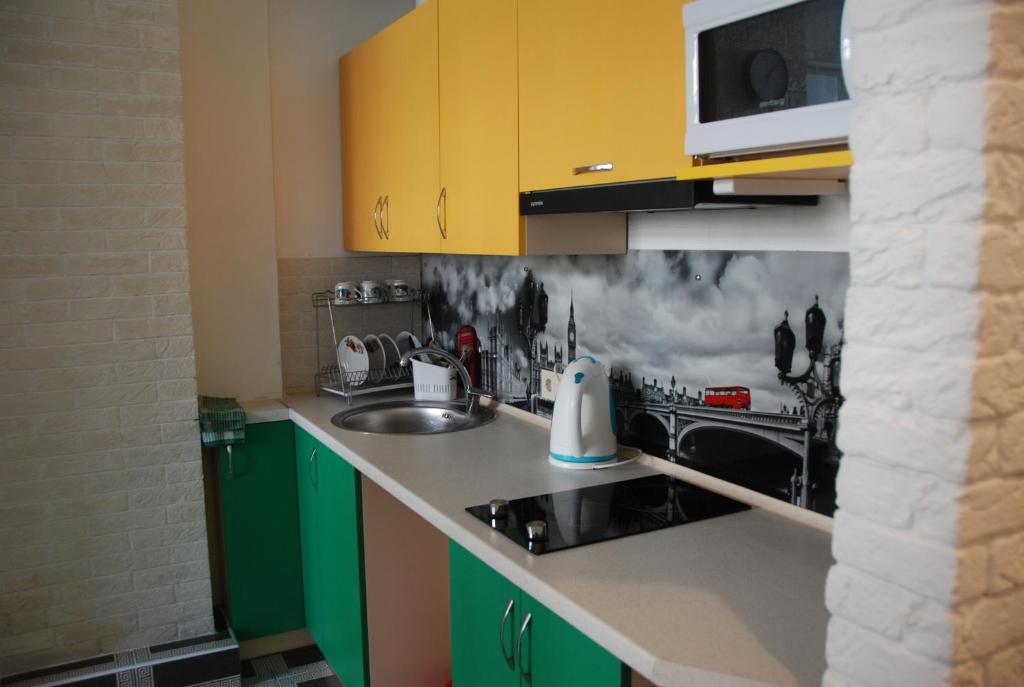 Kuchyň nebo kuchyňský kout v ubytování Green Apple Hostel