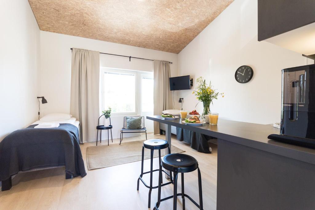 Η κουζίνα ή μικρή κουζίνα στο Spot Apartments Uusmäki