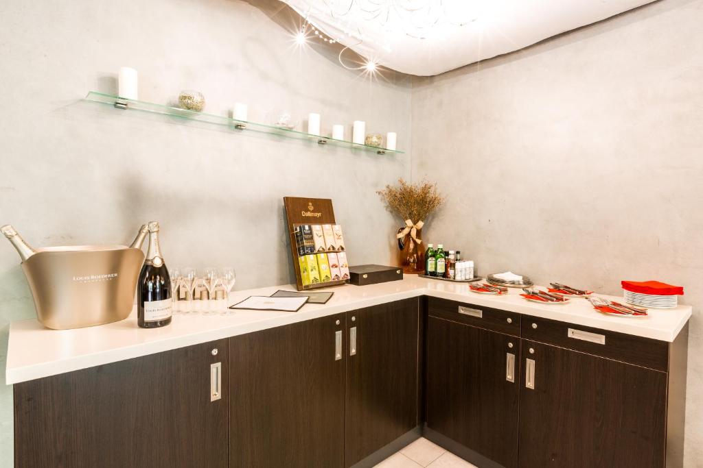 Kuchyň nebo kuchyňský kout v ubytování Hotel Mandát