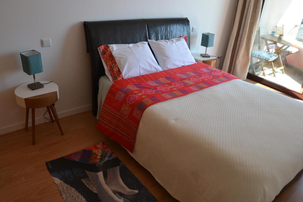 Postel nebo postele na pokoji v ubytování Hostel D'Avenida