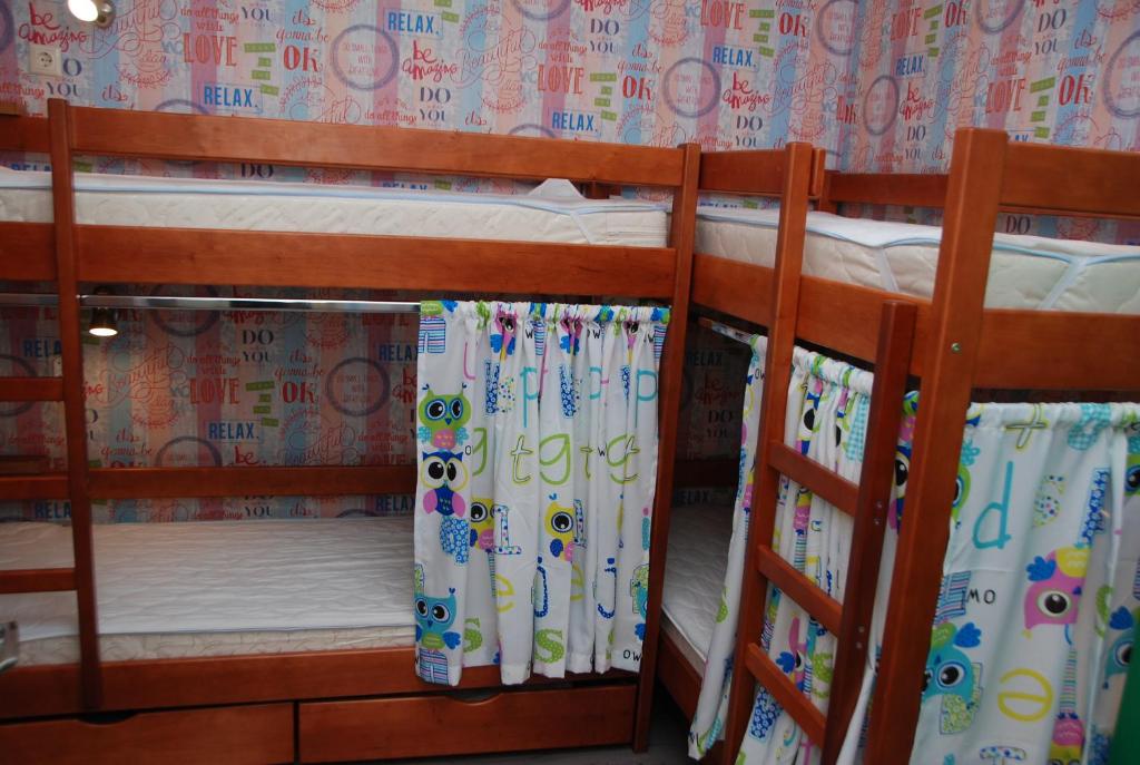 Postel nebo postele na pokoji v ubytování Green Apple Hostel