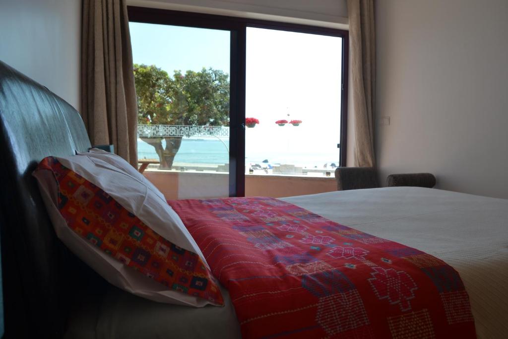 Postel nebo postele na pokoji v ubytování Hostel D'Avenida