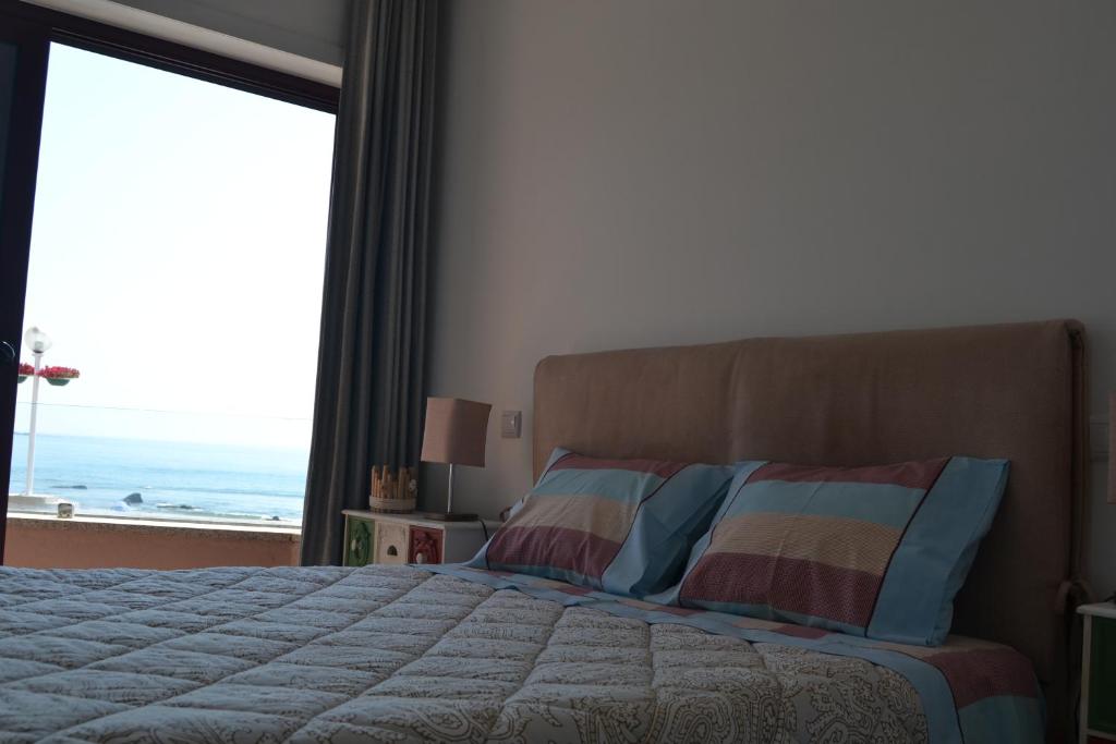 Postel nebo postele na pokoji v ubytování Hostel D'Avenida