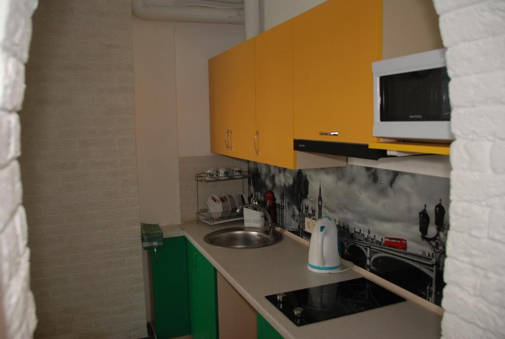 Kuchyň nebo kuchyňský kout v ubytování Green Apple Hostel