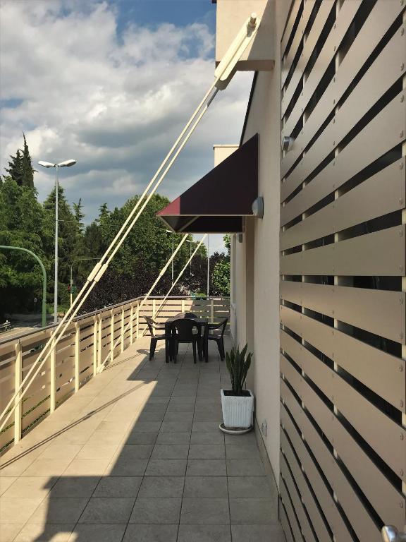 A balcony or terrace at Gardaselle Holiday Rooms