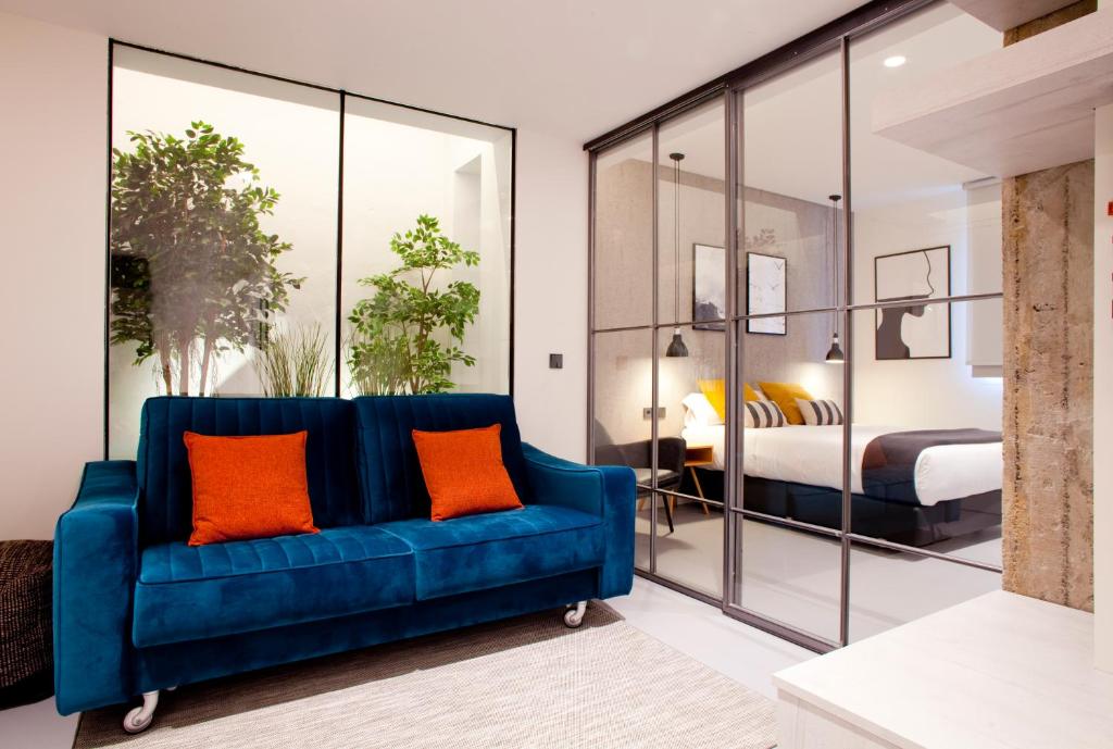 Postel nebo postele na pokoji v ubytování Bilbao Centric Apartments