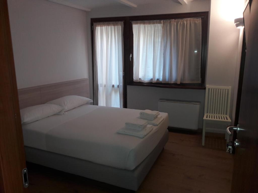 Postel nebo postele na pokoji v ubytování Albergo Diffuso Belvedere