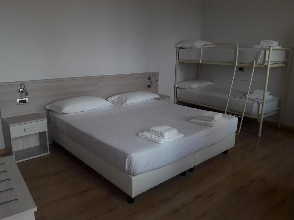 Postel nebo postele na pokoji v ubytování Albergo Diffuso Belvedere