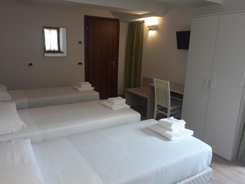 Postel nebo postele na pokoji v ubytování Albergo Diffuso Belvedere