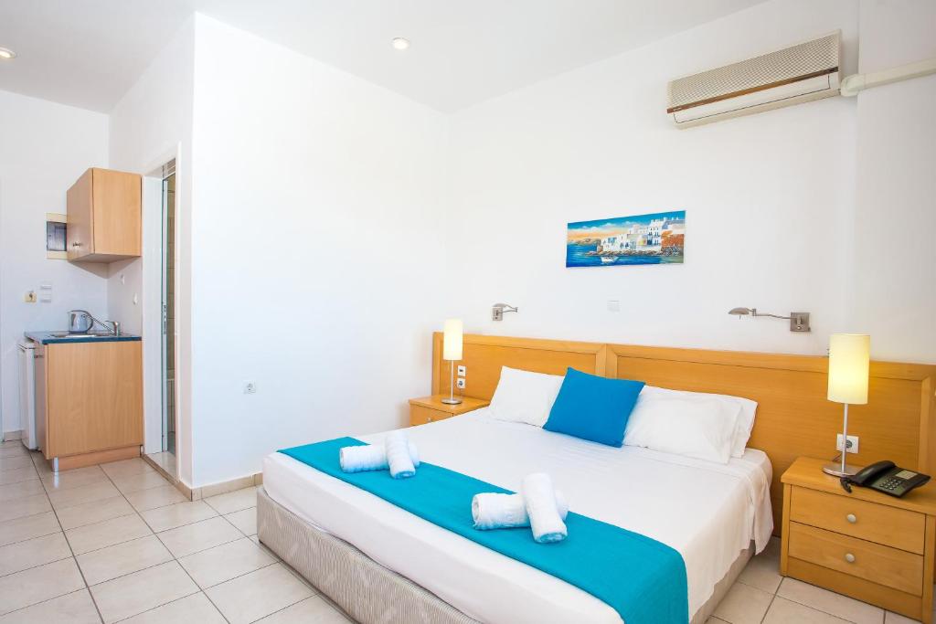 Postel nebo postele na pokoji v ubytování Mon Repos Hotel