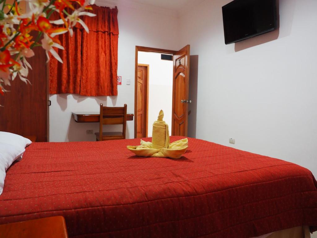 Postel nebo postele na pokoji v ubytování Hostal España