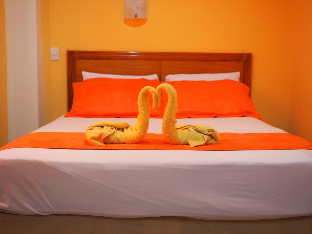 Postel nebo postele na pokoji v ubytování Hostal España