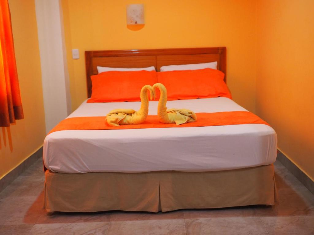 Postel nebo postele na pokoji v ubytování Hostal España