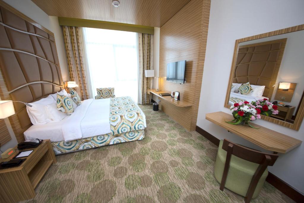 Postel nebo postele na pokoji v ubytování Best Western Plus Pearl Creek