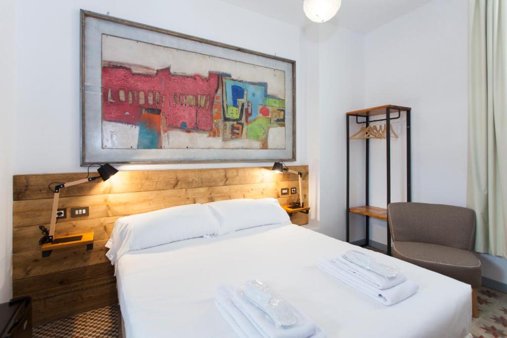 Letto o letti in una camera di Gran H La Marina