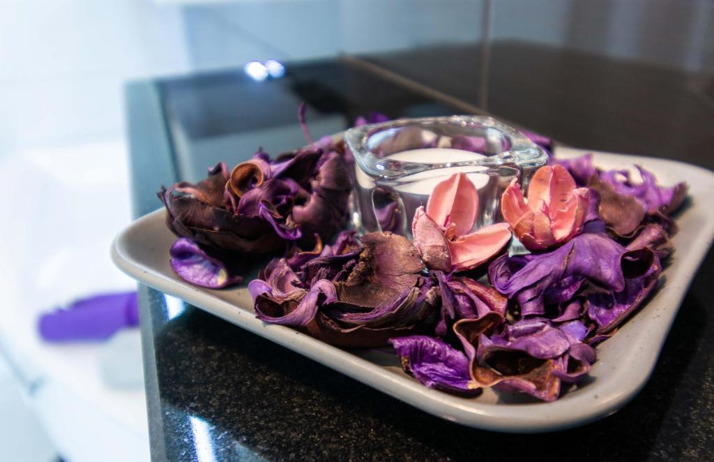 a bowl of purple cabbage sitting on a table at Apartment MATEA in Kobarid