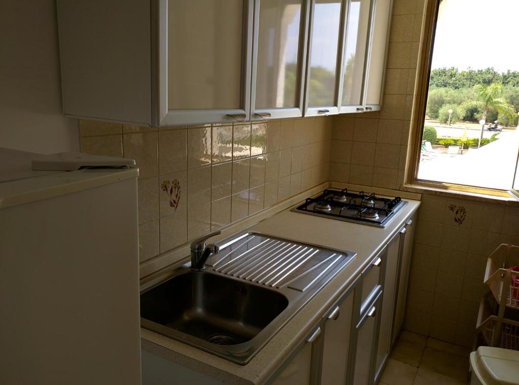 Kuchyň nebo kuchyňský kout v ubytování Residence Atlante
