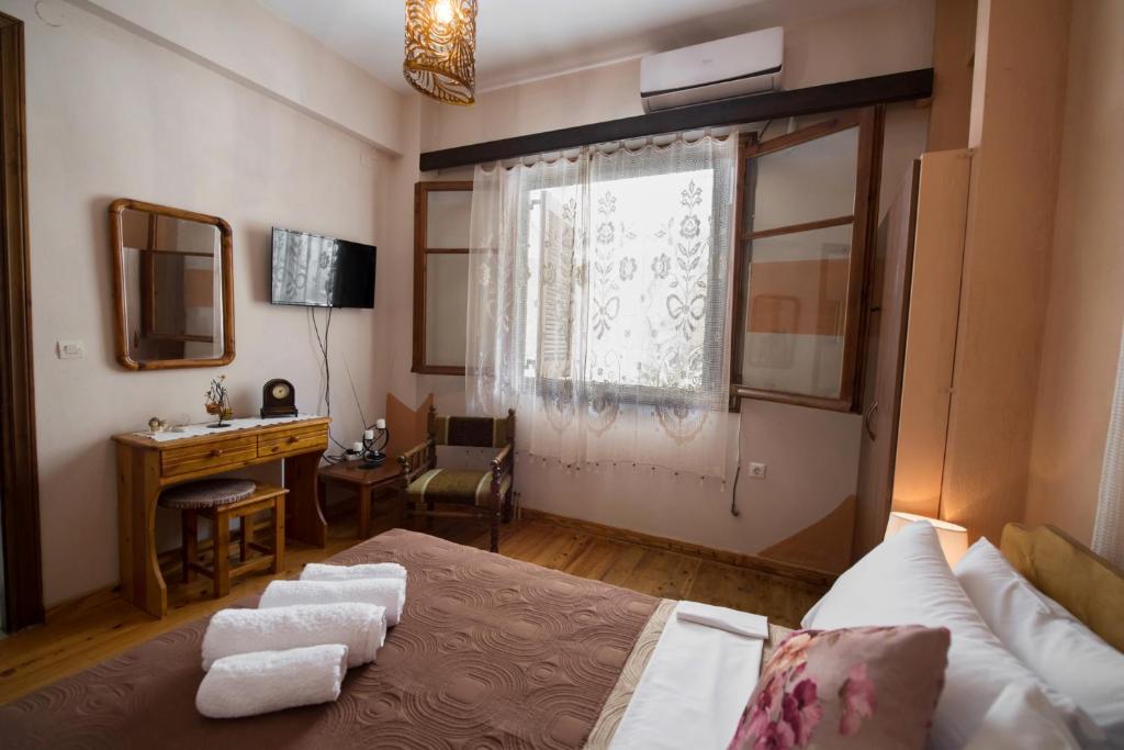 Cama o camas de una habitación en Manthiata Studios