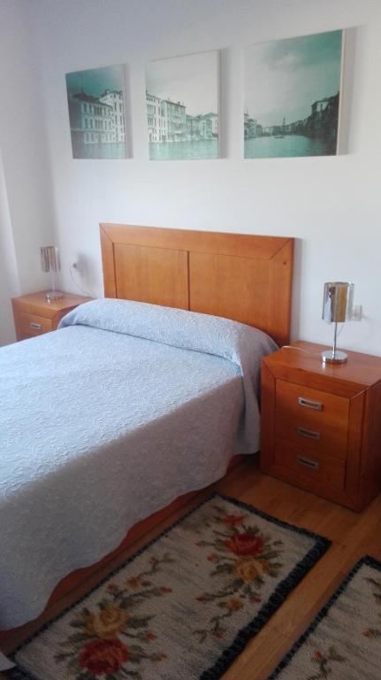 Posteľ alebo postele v izbe v ubytovaní Apartamento As Laxes de Illa de Arousa