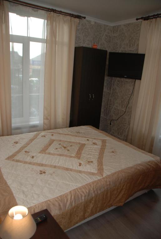 Postel nebo postele na pokoji v ubytování Green Apple Hostel
