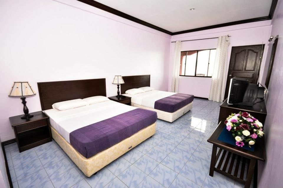 Ліжко або ліжка в номері Panuba Inn Resort