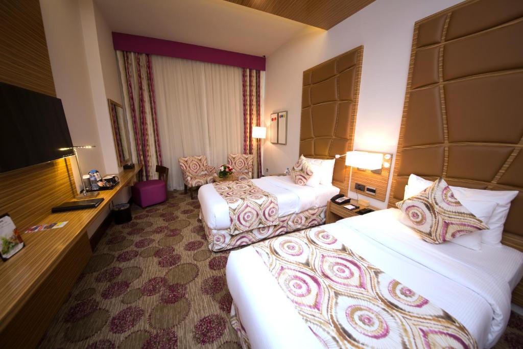Postel nebo postele na pokoji v ubytování Best Western Plus Pearl Creek