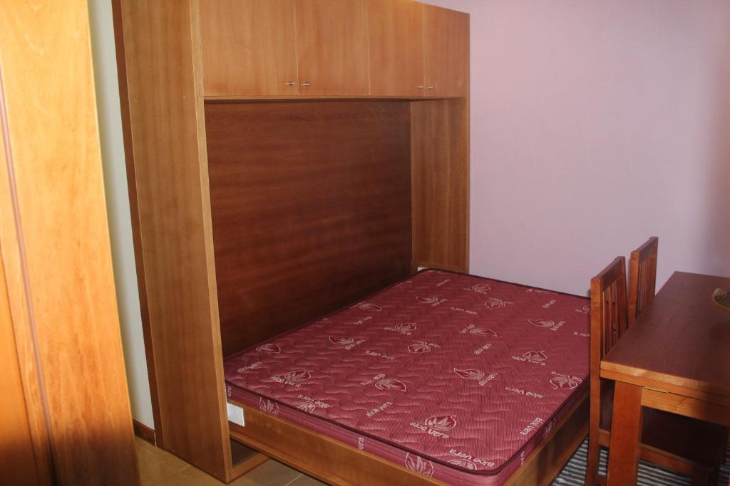 Postel nebo postele na pokoji v ubytování Pála dos Mouros