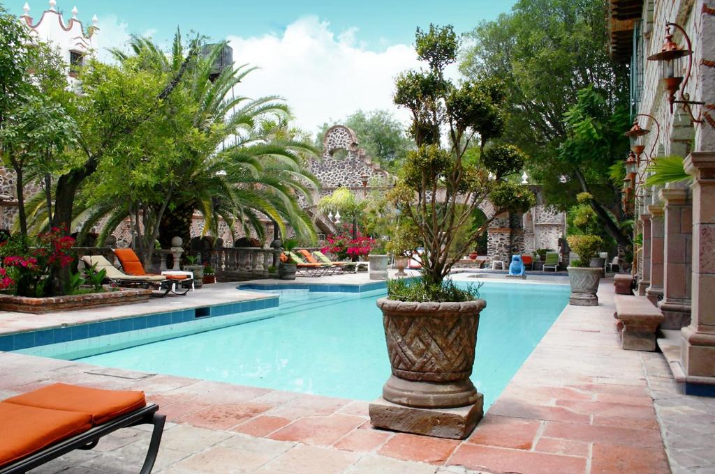 Bazén v ubytování Hotel Ex Hacienda La Pitaya Querétaro nebo v jeho okolí