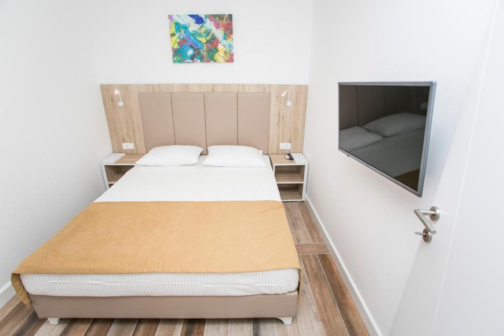 Postel nebo postele na pokoji v ubytování Villa Delux