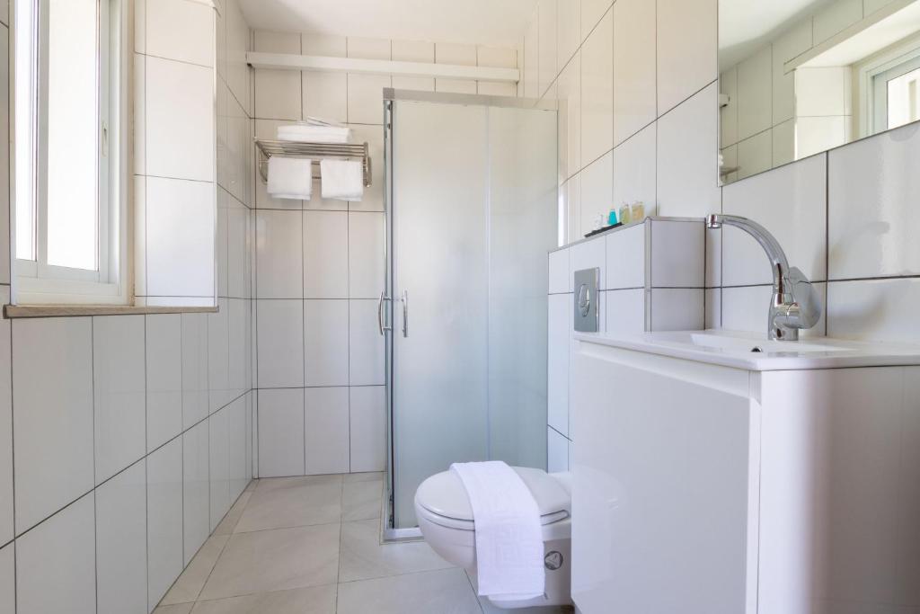 Kúpeľňa v ubytovaní DEM Hotel