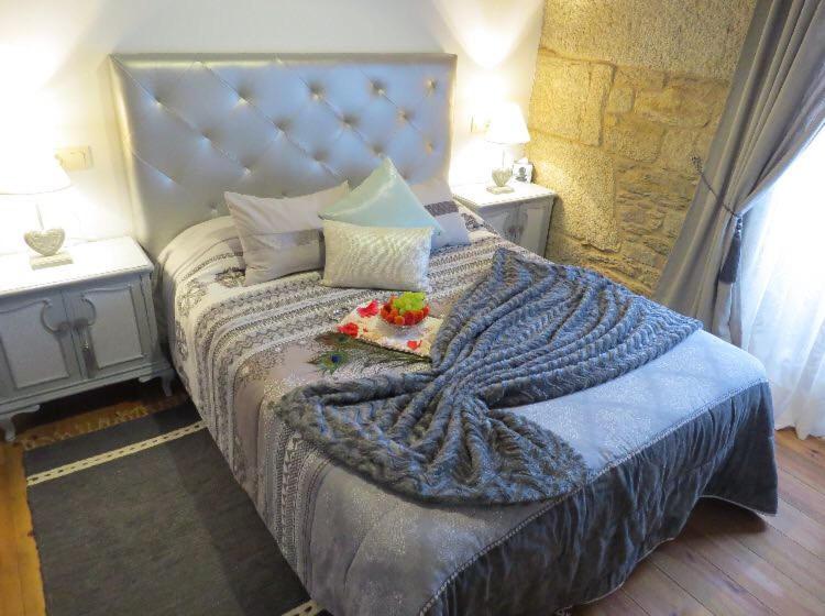 Cama o camas de una habitación en Casa A Canteira