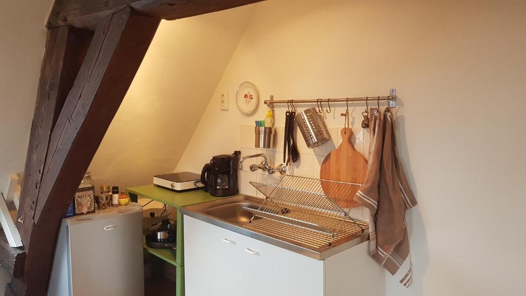 Kuchyň nebo kuchyňský kout v ubytování Homestay Stavenisse
