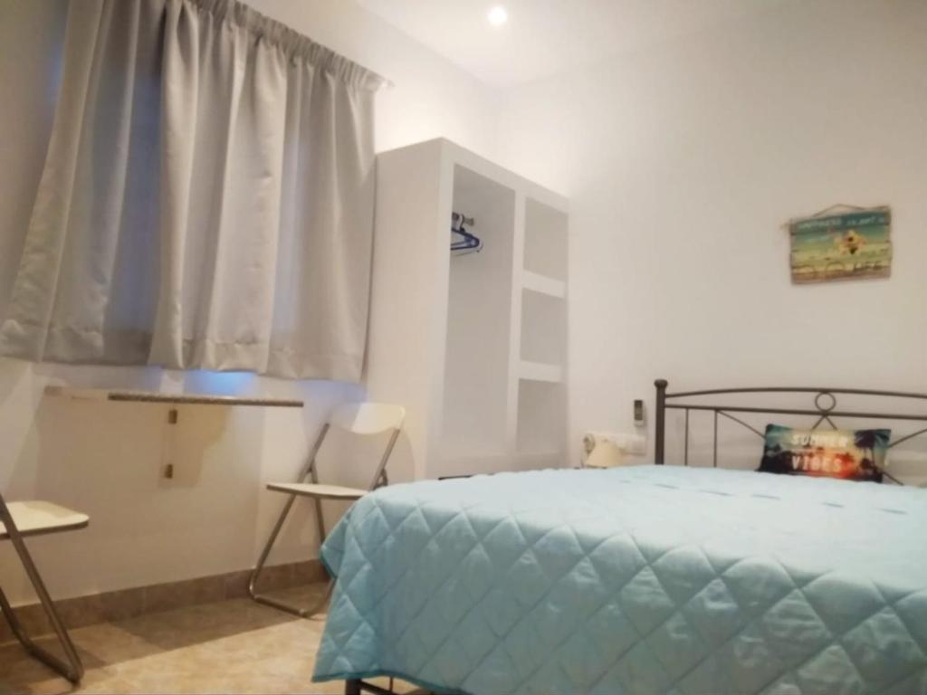 Llit o llits en una habitació de Psathi Beach