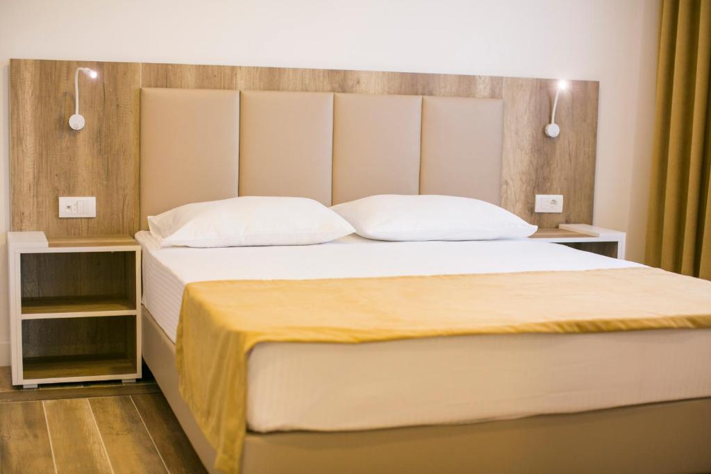 Postel nebo postele na pokoji v ubytování Villa Delux