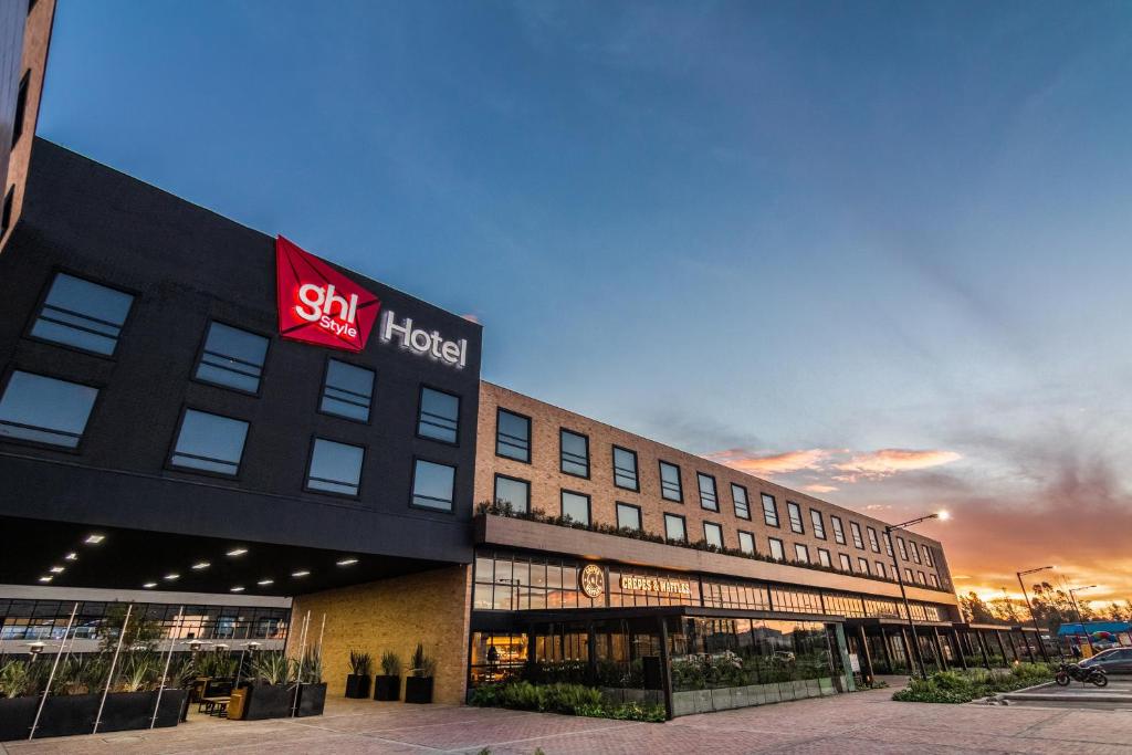 a building with a sign on the front of it at GHL Hotel Bogota Occidente in Bogotá