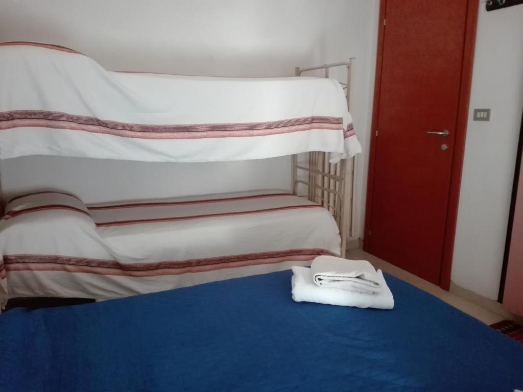A bed or beds in a room at New Prophet